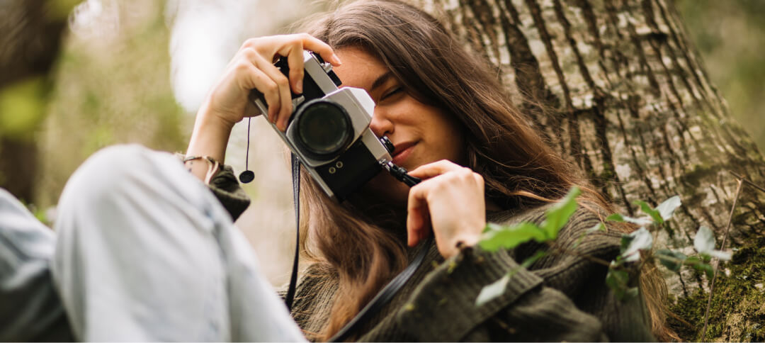 Дівчина з камерою